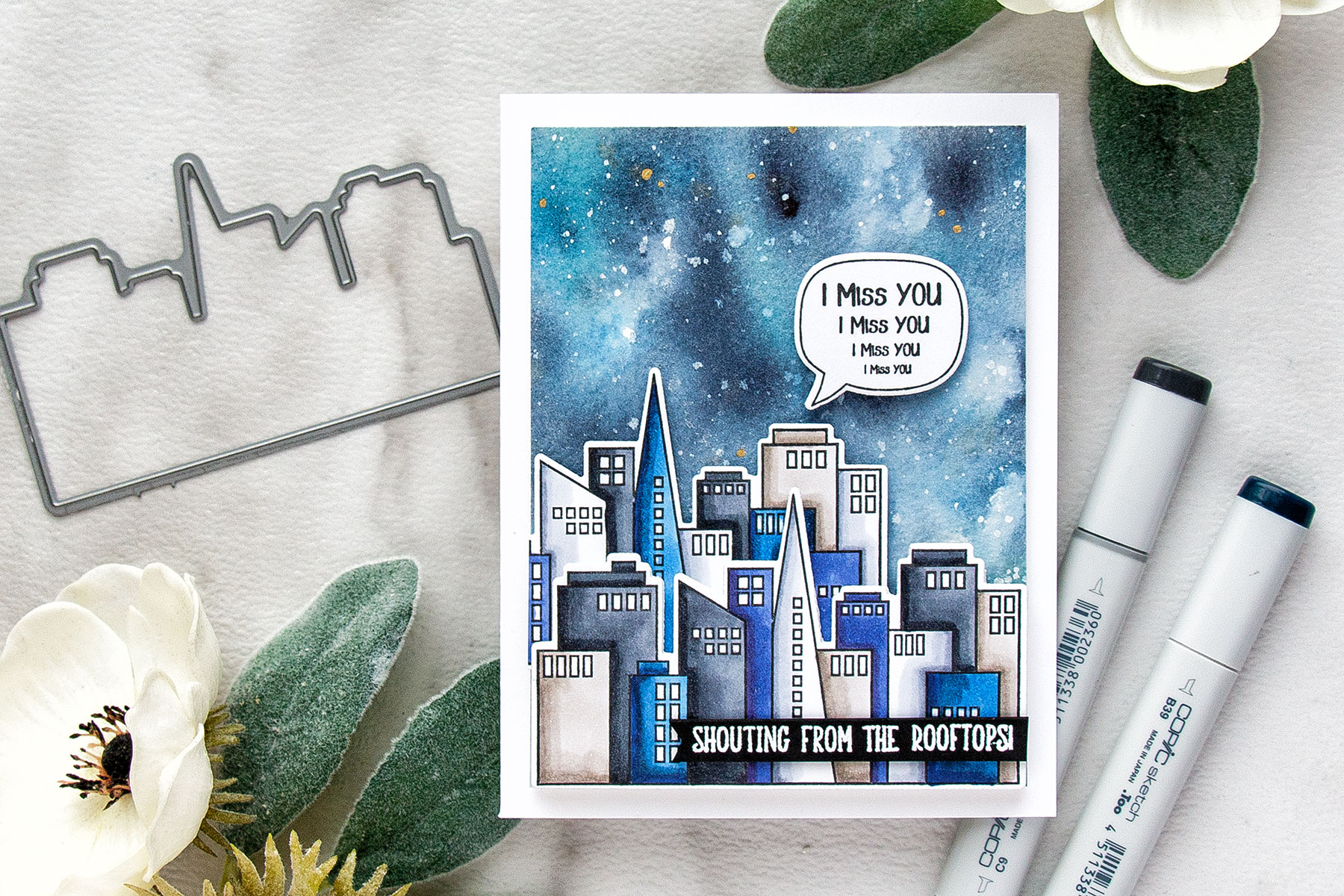 Simon Says Stamp | Shouting From The Rooftops - Miss You Card by Yana Smakula. Galaxy Background + Copic Colored Skyscrapers #simonsaysstamp #sssfriends #watercolorsky #nightskywatercolor #cardmaking #handmadecard