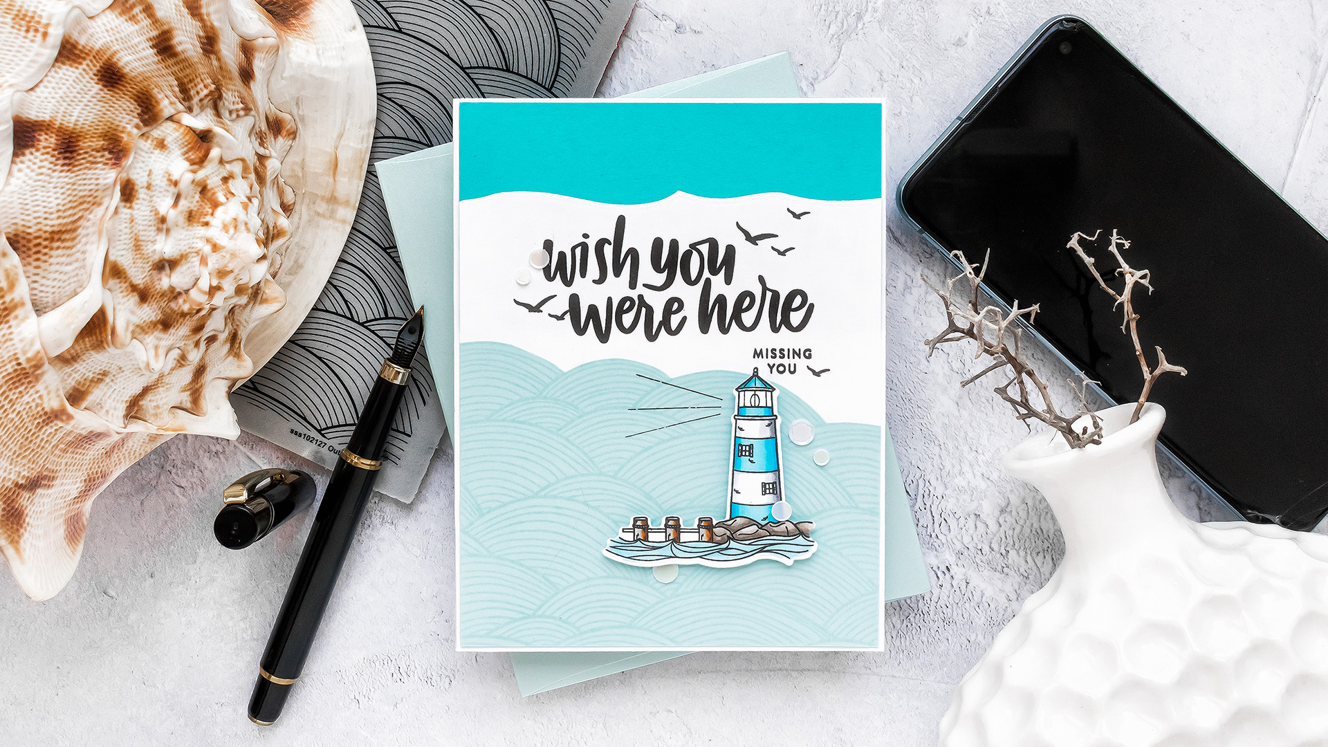 Simon Says Stamp | Wish You Were Here Card - Inspired by Book Cover featuring YOUR LIGHT sss101999, OUT TO SEA sss102127 and VACATION TIME sss101855 #SimonSaysStamp #Cardmaking #handmadecard #copiccoloring #stamping